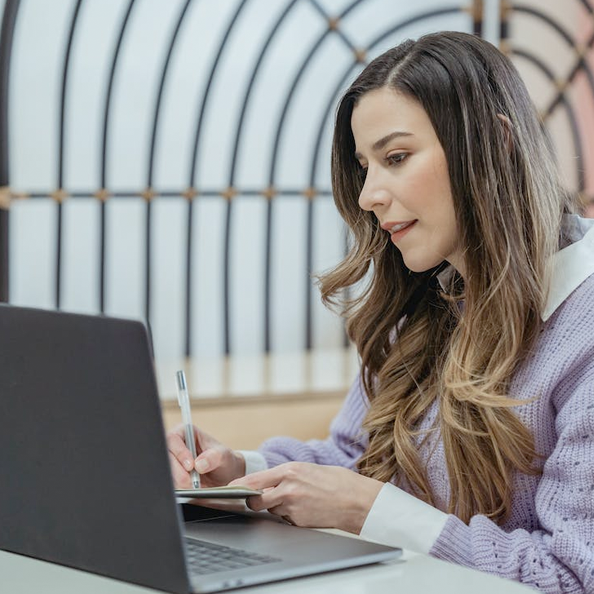 Woman working remotely on laptop